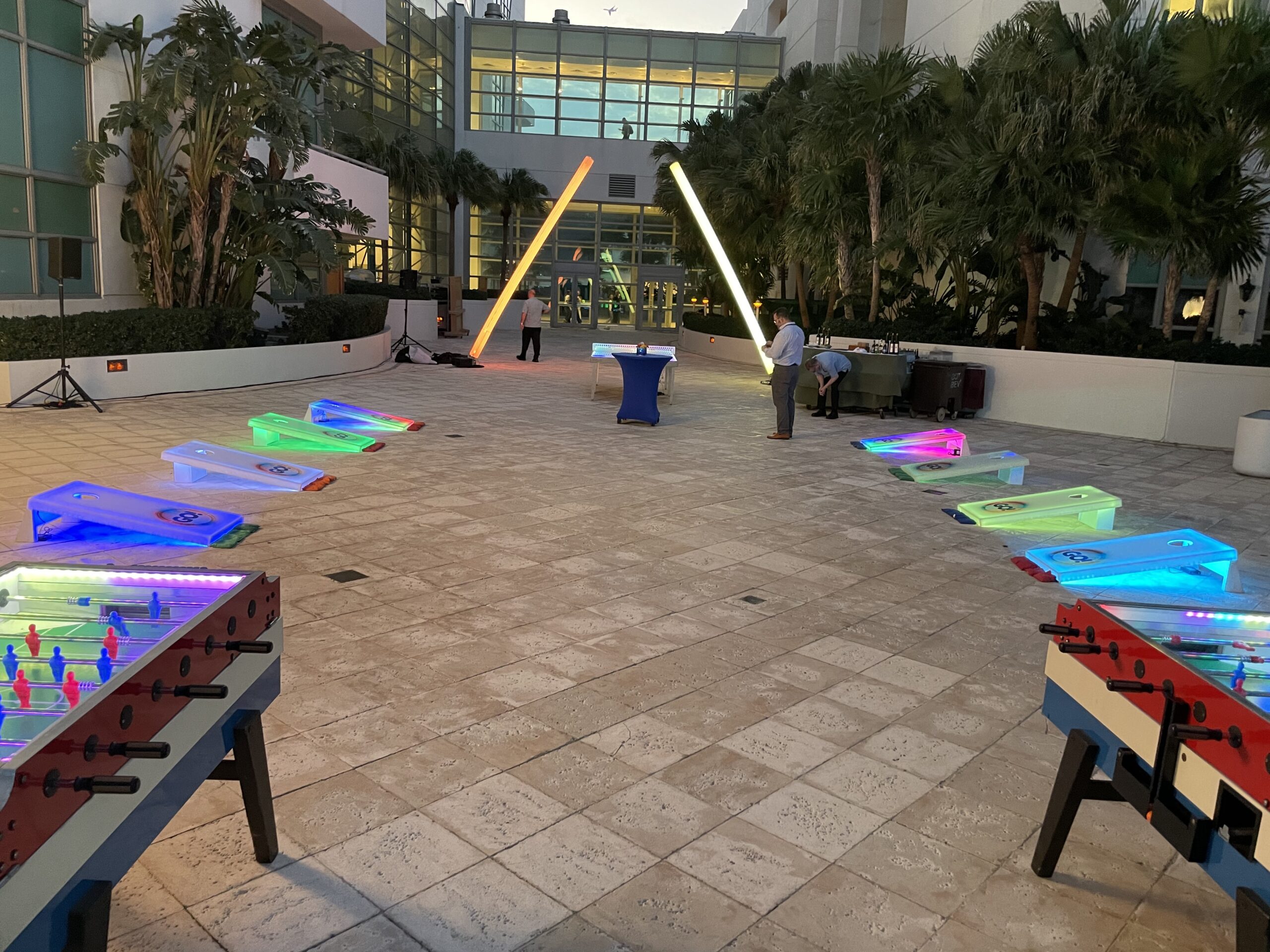 led branded corn hole and foosball scaled